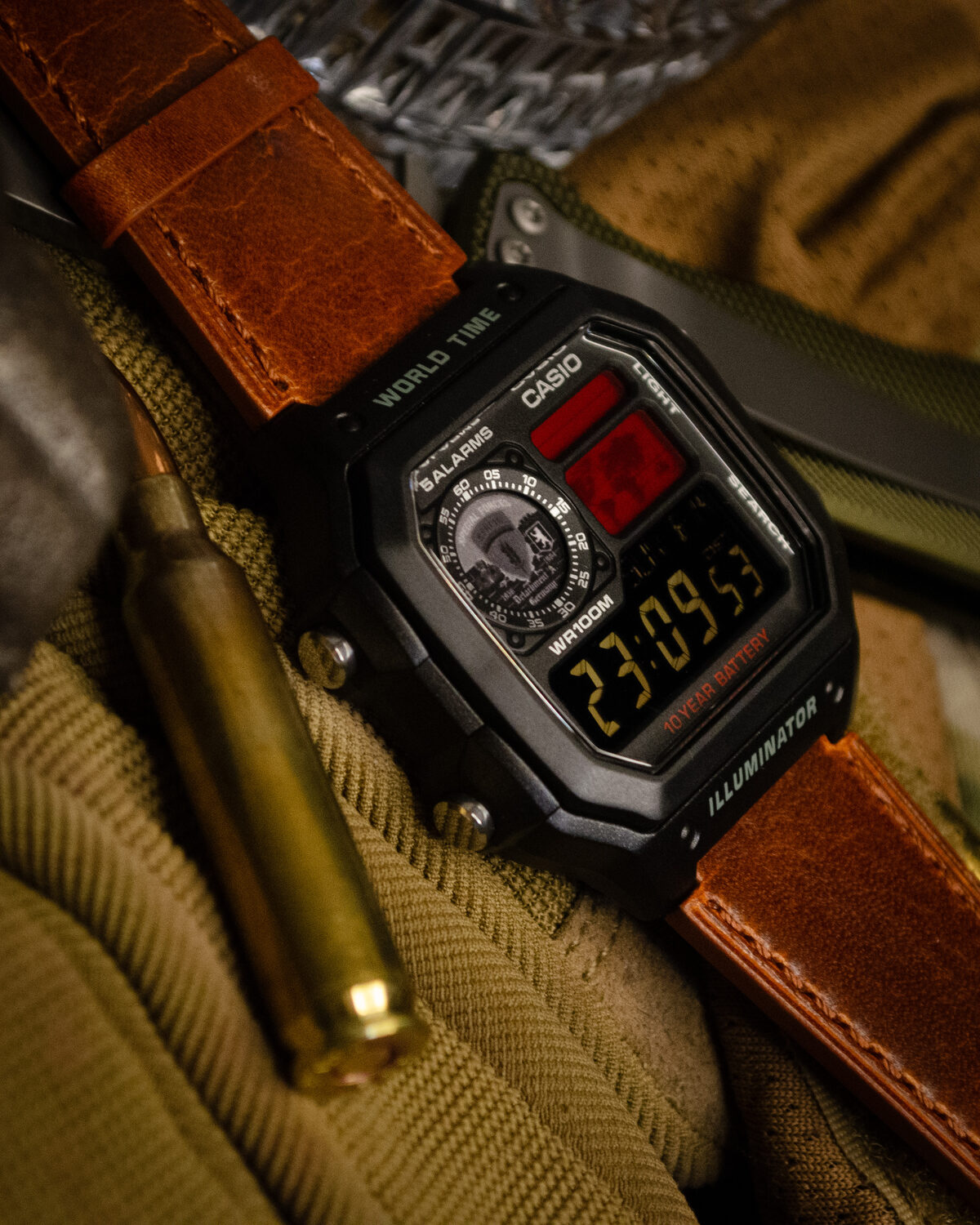 Special Forces build — black case with tactical-themed dial and leather strap